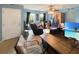 Living room featuring two windows, fan and light, and doorway at 120 Larkspur Dr, Goose Creek, SC 29445