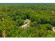 Overhead view of charming home with detached garage and tree-lined property within a lush neighborhood at 121 Arrowridge Ct, Summerville, SC 29485