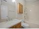 Bathroom features a single sink vanity with wooden cabinets and a shower-tub combination at 121 Arrowridge Ct, Summerville, SC 29485