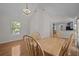 Cozy dining area with a view into the adjacent modern kitchen at 121 Arrowridge Ct, Summerville, SC 29485