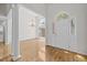 Inviting foyer with soaring ceilings, hardwood floors, and elegant chandelier at 121 Arrowridge Ct, Summerville, SC 29485