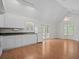 Spacious kitchen with white cabinets, vaulted ceilings and plenty of natural light at 121 Arrowridge Ct, Summerville, SC 29485