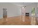 Bright living room with fireplace, hardwood floors, and large windows at 121 Arrowridge Ct, Summerville, SC 29485