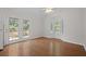 Open living area featuring backyard access and corner windows for natural light at 121 Arrowridge Ct, Summerville, SC 29485