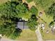 Aerial perspective of a home site with mature trees, circular driveway, and parking for a boat at 122 Mellard Dr, Goose Creek, SC 29445