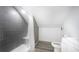 Bathroom with gray tiled shower and white vanity and toilet at 122 Mellard Dr, Goose Creek, SC 29445