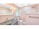 Modern bathroom with glass sink, rainfall shower, and decorative pendant lighting at 122 Mellard Dr, Goose Creek, SC 29445