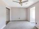 Neutral bedroom featuring a closet and ceiling fan perfect for relaxation at 122 Mellard Dr, Goose Creek, SC 29445