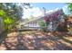 Expansive backyard with a hammock and deck for outdoor relaxation and entertaining under the shade at 1287 Chatfield St, Mount Pleasant, SC 29464