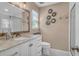 Tastefully remodeled bathroom with a sleek vanity and decorative mirrors at 1287 Chatfield St, Mount Pleasant, SC 29464