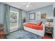 Cozy bedroom with a daybed, ample natural light, and stylish decor create a welcoming and comfortable space at 1287 Chatfield St, Mount Pleasant, SC 29464