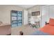 Organized bedroom featuring a bookshelf, desk, and a cozy sitting area at 1287 Chatfield St, Mount Pleasant, SC 29464