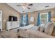 Bright bedroom with a plush bed, complemented by soft, blue accents at 1287 Chatfield St, Mount Pleasant, SC 29464