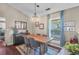Inviting dining room with modern lighting, hardwood floors, and stylish decor at 1287 Chatfield St, Mount Pleasant, SC 29464