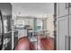 Bright kitchen with white cabinets, dark countertops, and stainless steel island for food preparation at 1287 Chatfield St, Mount Pleasant, SC 29464