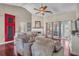 Bright and airy living room with hardwood floors, fireplace, and cozy seating at 1287 Chatfield St, Mount Pleasant, SC 29464