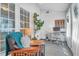 Inviting sunroom office with lots of natural light and comfortable seating area at 1287 Chatfield St, Mount Pleasant, SC 29464