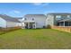 Spacious backyard, fenced in, with an outdoor patio at 130 Spotted Way, Summerville, SC 29485