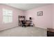 Pink bedroom with carpet, large window, and desk at 130 Spotted Way, Summerville, SC 29485