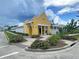 Charming clubhouse with well-kept landscaping and vibrant colors in a community setting at 130 Spotted Way, Summerville, SC 29485