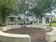 Relaxing community space with shaded seating area and manicured landscaping at 130 Spotted Way, Summerville, SC 29485