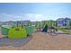 Community playground with unique green equipment and a soft landing surface for children to enjoy at 130 Spotted Way, Summerville, SC 29485