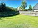 View of the expansive backyard, featuring a well-maintained lawn and a privacy fence at 1333 Song Sparrow Way, Hanahan, SC 29410