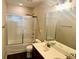 Bathroom featuring double sinks, a modern toilet, and a glass enclosed shower at 1333 Song Sparrow Way, Hanahan, SC 29410