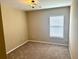 Neutral bedroom features neutral carpeting and natural light from the window at 1333 Song Sparrow Way, Hanahan, SC 29410
