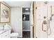 Bathroom featuring a granite countertop, walk-in shower with light beige walls at 14 Lockwood Dr # 4C, Charleston, SC 29401