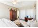 Bedroom with ceiling fan features windows with views, desk and an ensuite bathroom at 14 Lockwood Dr # 4C, Charleston, SC 29401