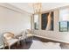 Bright living room featuring stylish decor, light beige walls and hardwood floors at 14 Lockwood Dr # 4C, Charleston, SC 29401