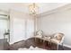 Bright living room featuring stylish decor, light beige walls and hardwood floors at 14 Lockwood Dr # 4C, Charleston, SC 29401