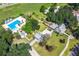 A stunning aerial view showcases the property's expansive grounds, pool area and landscaping at 141 Cherry Grove Dr, Summerville, SC 29483