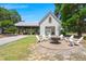 Relax by the firepit with Adirondack chairs and enjoy the nearby pavilion at 141 Cherry Grove Dr, Summerville, SC 29483