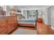 Spacious bedroom features a large window and matching wood furniture set at 1521 Wren Ave, Mount Pleasant, SC 29464