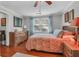 Well-lit bedroom boasts a matching dresser and nightstand set made of light wood at 1521 Wren Ave, Mount Pleasant, SC 29464