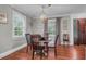 Cozy dining room with hardwood floors, neutral walls, and natural light, perfect for Gathering meals at 1521 Wren Ave, Mount Pleasant, SC 29464