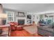 Cozy living room with hardwood floors, fireplace, built-in shelving, and comfortable seating at 1521 Wren Ave, Mount Pleasant, SC 29464
