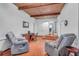 Comfortable living room features wood ceilings, hardwood floors, and comfortable seating at 1521 Wren Ave, Mount Pleasant, SC 29464