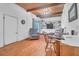 Cozy living room featuring hardwood floors, built-in shelves, and two comfortable reclining chairs at 1521 Wren Ave, Mount Pleasant, SC 29464