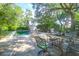 Relaxing backyard featuring a pool, patio with outdoor seating, and lush landscaping for entertaining at 1521 Wren Ave, Mount Pleasant, SC 29464