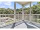 Balcony view looking out to neighborhood featuring various houses, trees, and lawns at 1631 Camfield Ln, Mount Pleasant, SC 29466