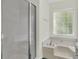 Bathroom featuring a walk-in shower and separate soaking tub, offering a spa-like experience at 1631 Camfield Ln, Mount Pleasant, SC 29466