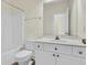 Well-lit bathroom featuring a shower-tub combo, toilet, and vanity, providing a functional and inviting space at 1631 Camfield Ln, Mount Pleasant, SC 29466