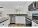Kitchen featuring white cabinets, a stainless steel dishwasher, granite countertops, and tile floors at 1631 Camfield Ln, Mount Pleasant, SC 29466