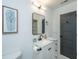 Updated bathroom with granite countertops, a stylish mirror, and decorative accents at 1655 Pinckney Park Dr, Charleston, SC 29407