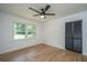 Sun-filled room with hardwood floors, ceiling fan, and two windows offerring natural light at 1655 Pinckney Park Dr, Charleston, SC 29407