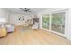 Bright and airy living room showcasing an open layout and easy access to the sunroom at 1655 Pinckney Park Dr, Charleston, SC 29407