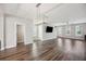 Open-concept living room featuring hardwood floors and modern recessed lighting at 1671 Indy Dr, North Charleston, SC 29405